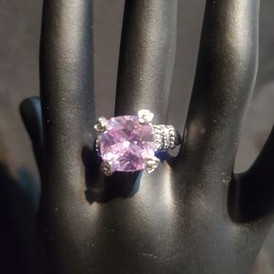 Silver ring with purple stone